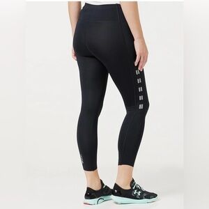 Under Armour UA Qualifier Speedpocket Roadside Runway Crop
